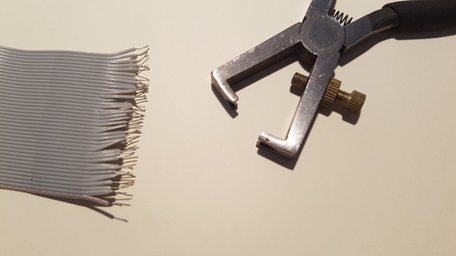 Dénudage de la nappe de 40 fils Dénudage de la nappe de 40 fils